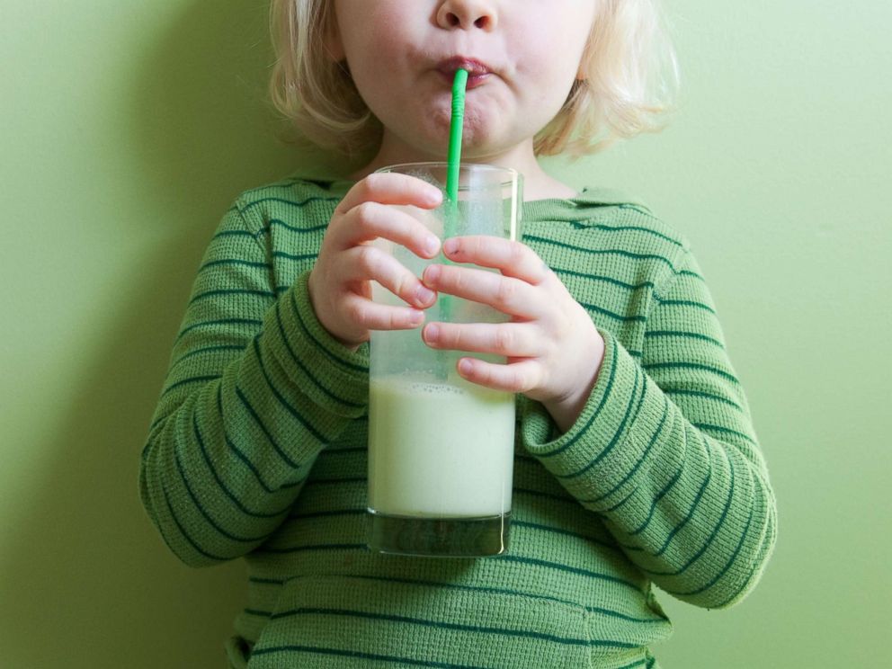 PHOTO: A toddler girl sips a drink through a straw in this undated stock photo.