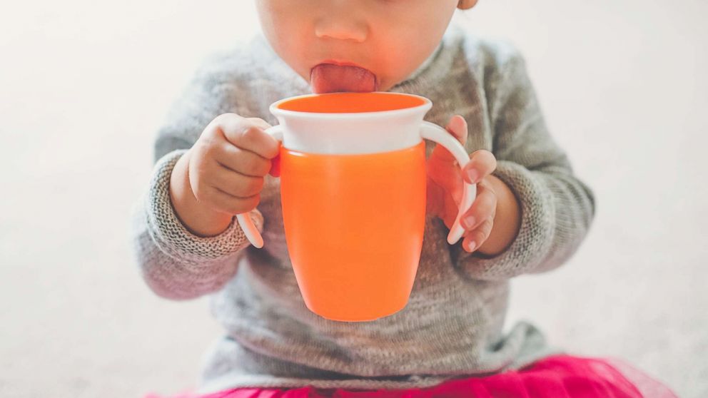 PHOTO: A toddler girl drinks from her sippy cup in this undated stock photo.
