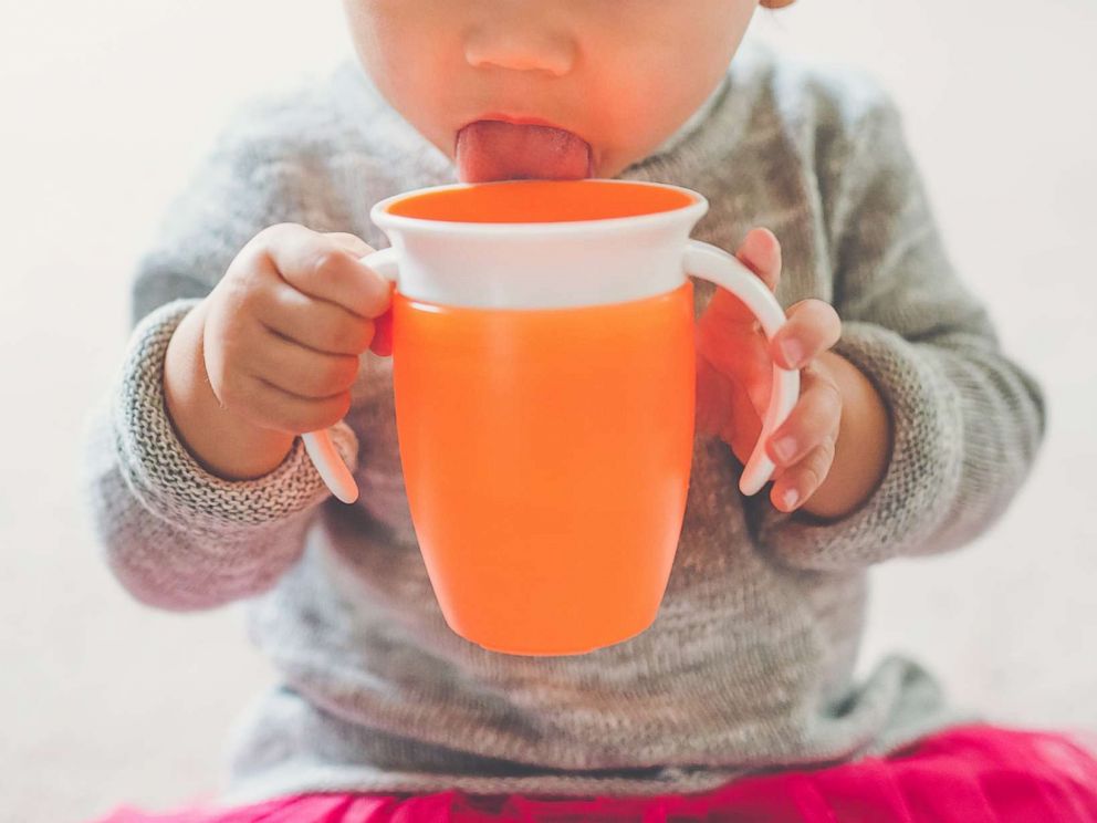 PHOTO: A toddler girl drinks from her sippy cup in this undated stock photo.