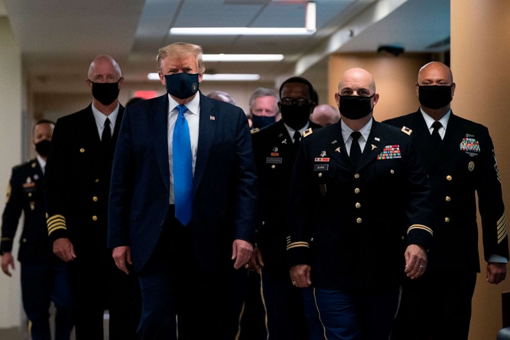 PHOTO: Donald Trump wears a mask as he visits Walter Reed National Military Medical Center in Bethesda, Maryland on July 11, 2020.