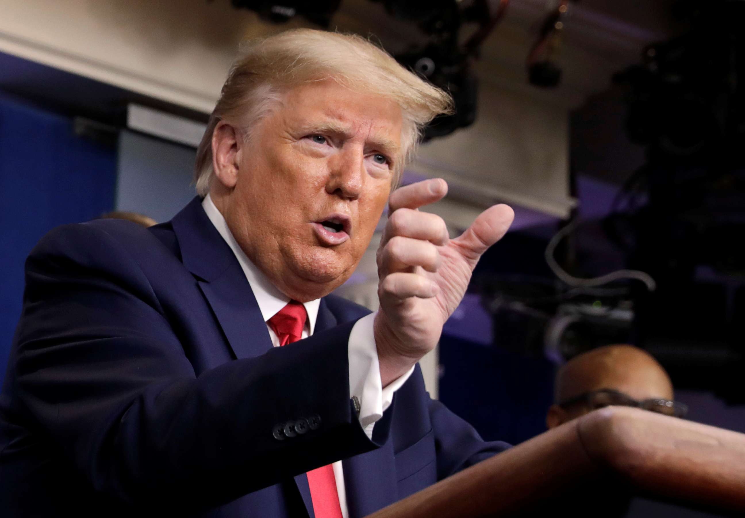 PHOTO: U.S. President Donald Trump gestures during a news conference, amid the coronavirus disease (COVID-19) outbreak, in Washington D.C., U.S., March 22, 2020. 