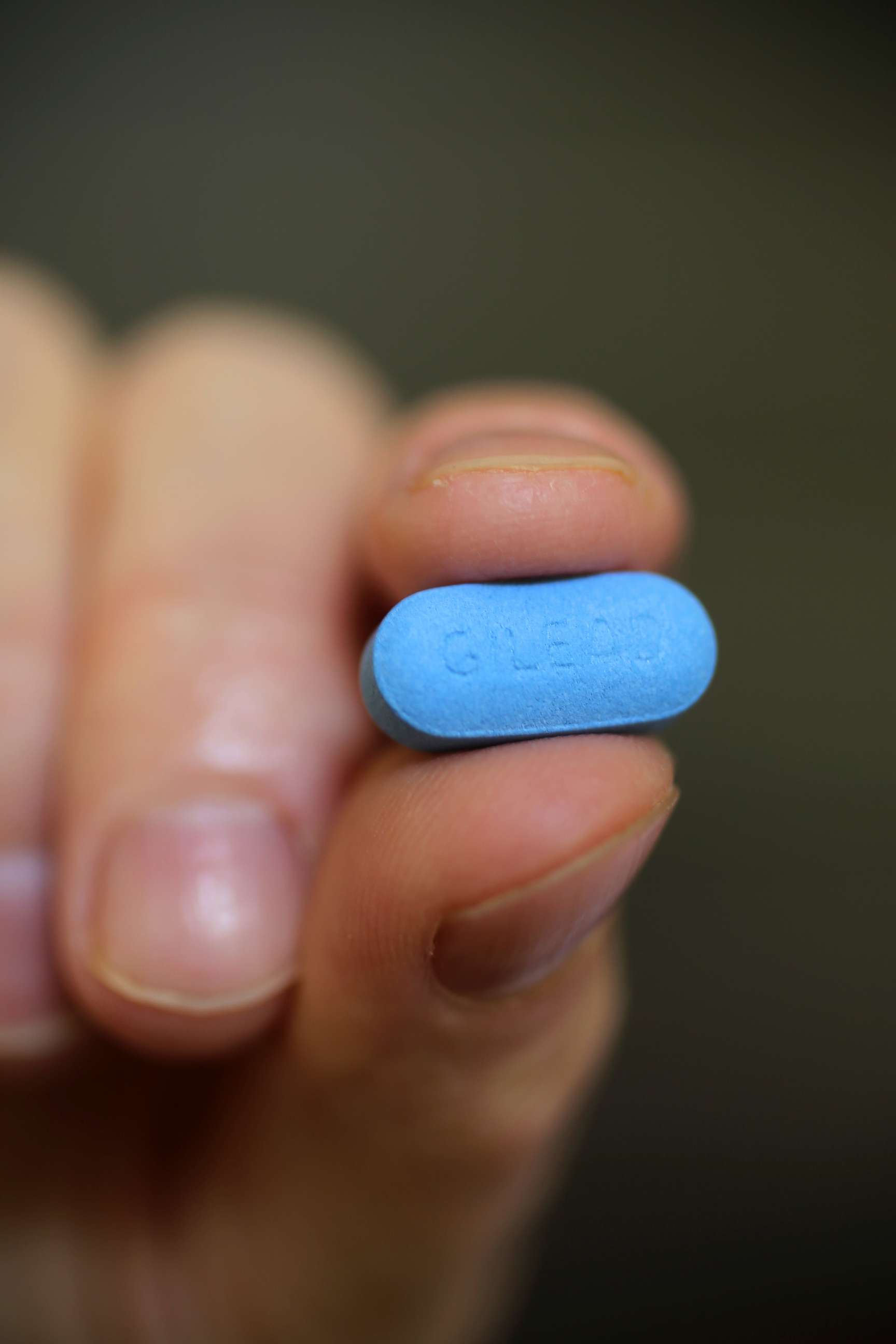 PHOTO: An HIV negative gay man holds his Truvada pill for the photographer in Watertown, Mass., Sept. 3, 2014.