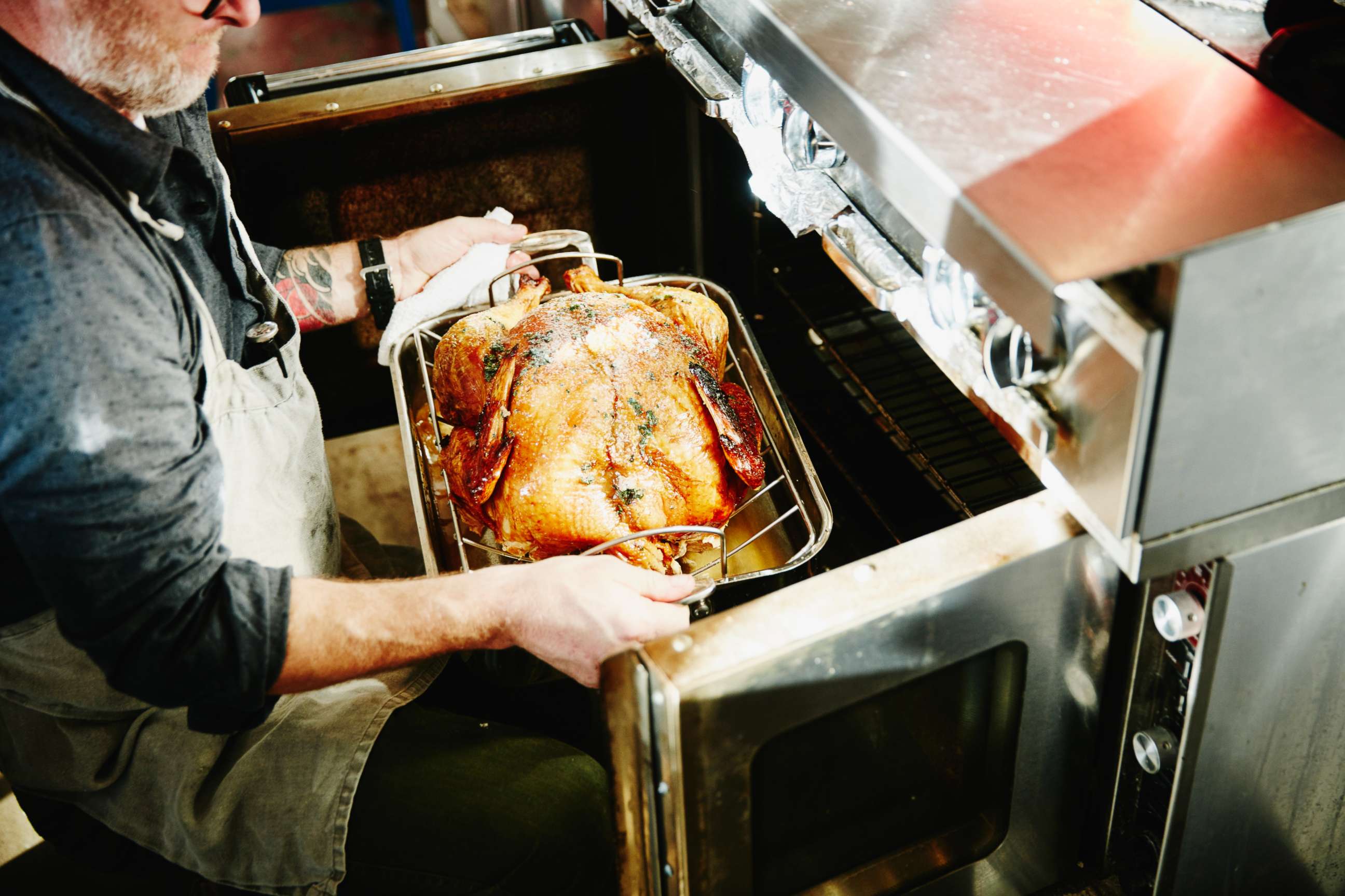 PHOTO: A man serves a turkey in an undated stock photo. 