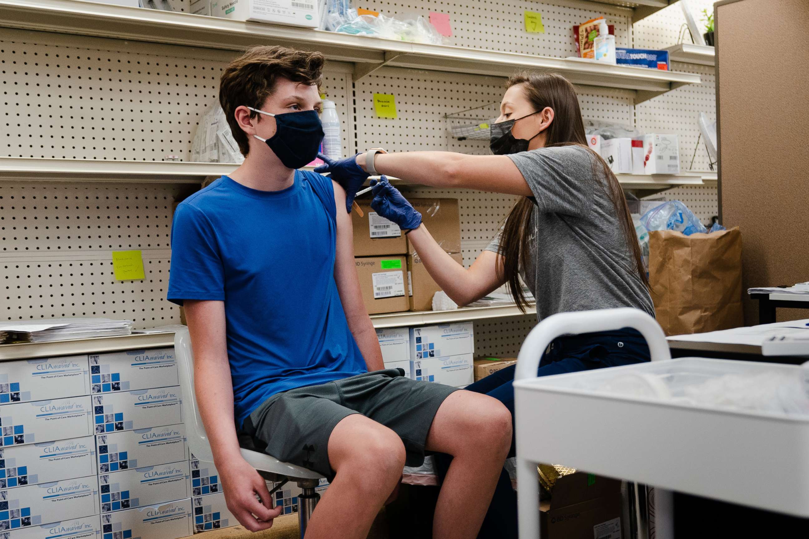 PHOTO: A 15-year-old receives his first COVID-19 vaccine at Kavanaugh Pharmacy in Little Rock, Ark., July 7, 2021.