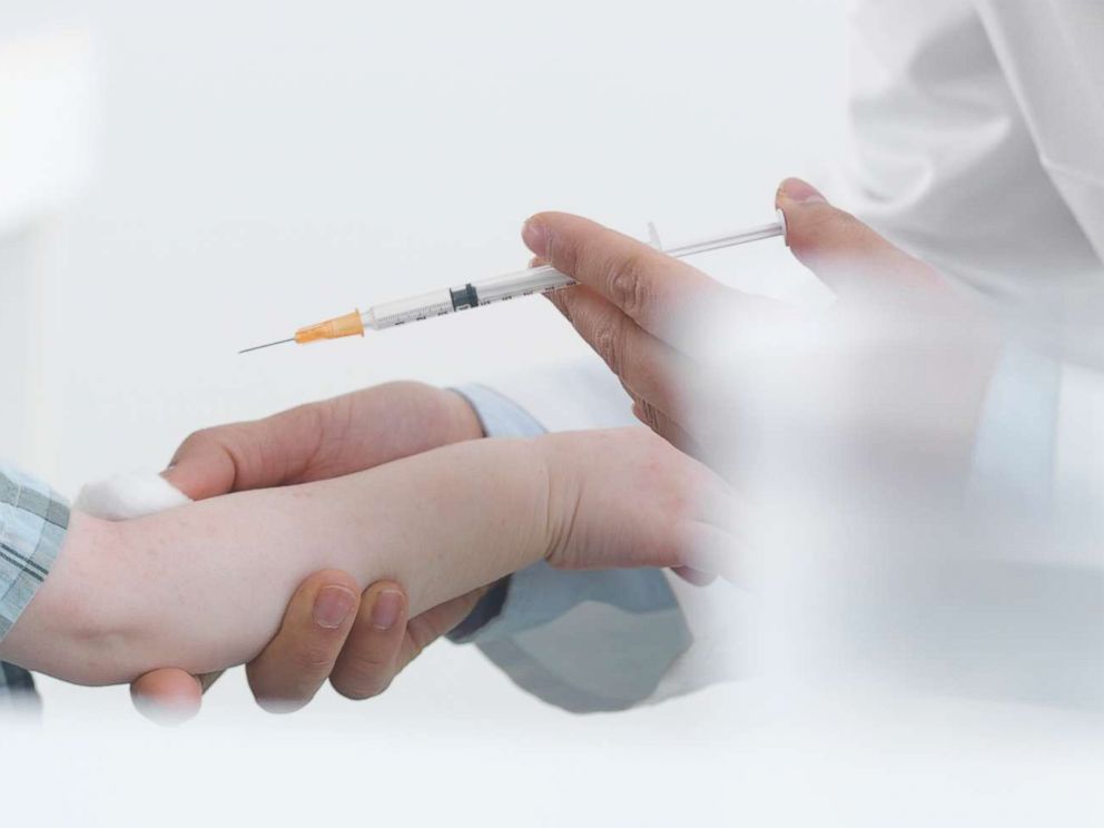 PHOTO: A doctor gives a child a vaccination in an undated stock photo.