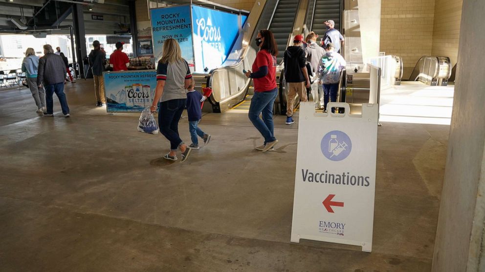 PHOTO: A vaccination check in offered at the ball park prior to the game between the Atlanta Braves and the Philadelphia Phillies at Truist Park, May 7, 2021, in  Cumberland, Ga. 
