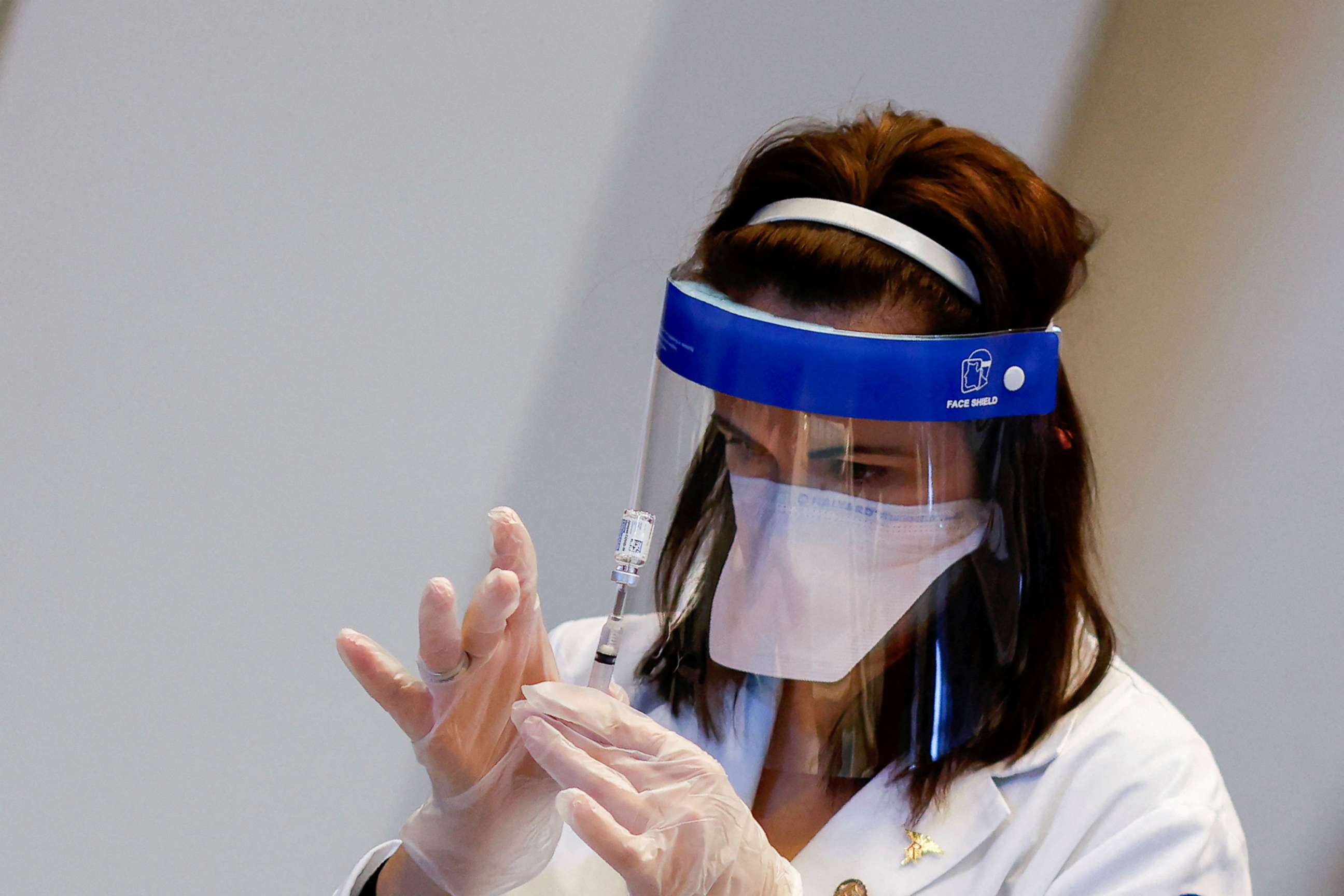 PHOTO: A medical worker prepares a syringe with a dose of the Johnson & Johnson COVID-19 vaccine at a vaccination center in in Chicago, April 6, 2021. 