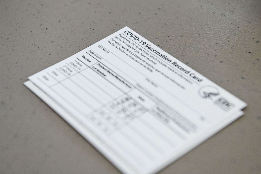 PHOTO: A COVID-19 vaccine record card is seen at Florida Memorial University vaccination site in Miami Gardens, Fla., April 14, 2021.