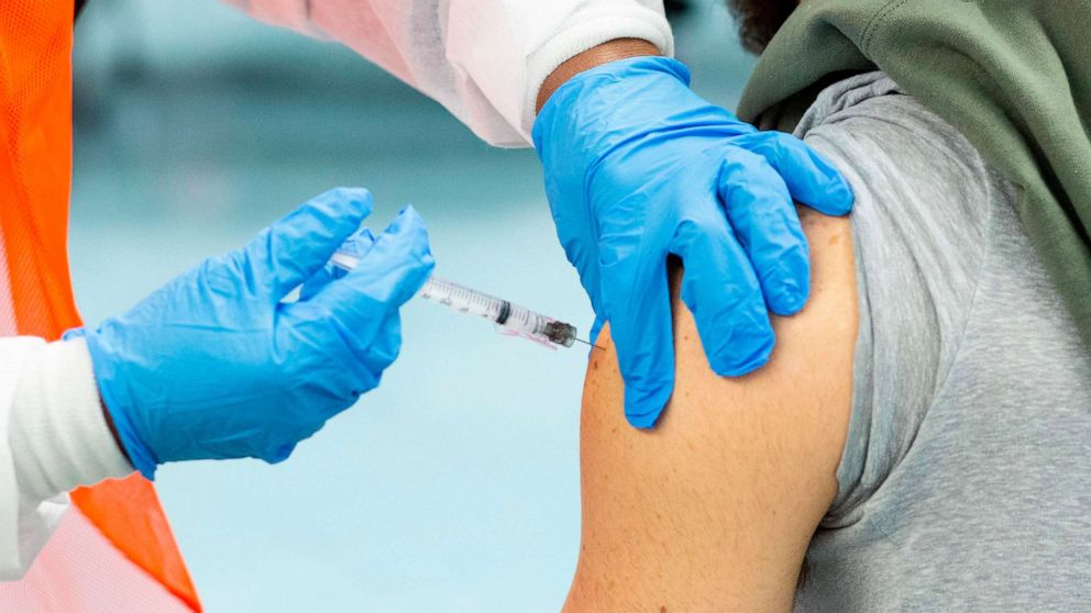PHOTO: A man receives a dose of the Moderna coronavirus disease (COVID-19) vaccine at a vaccination site at South Bronx Educational Campus, in the Bronx, New York, Jan. 10, 2021. 