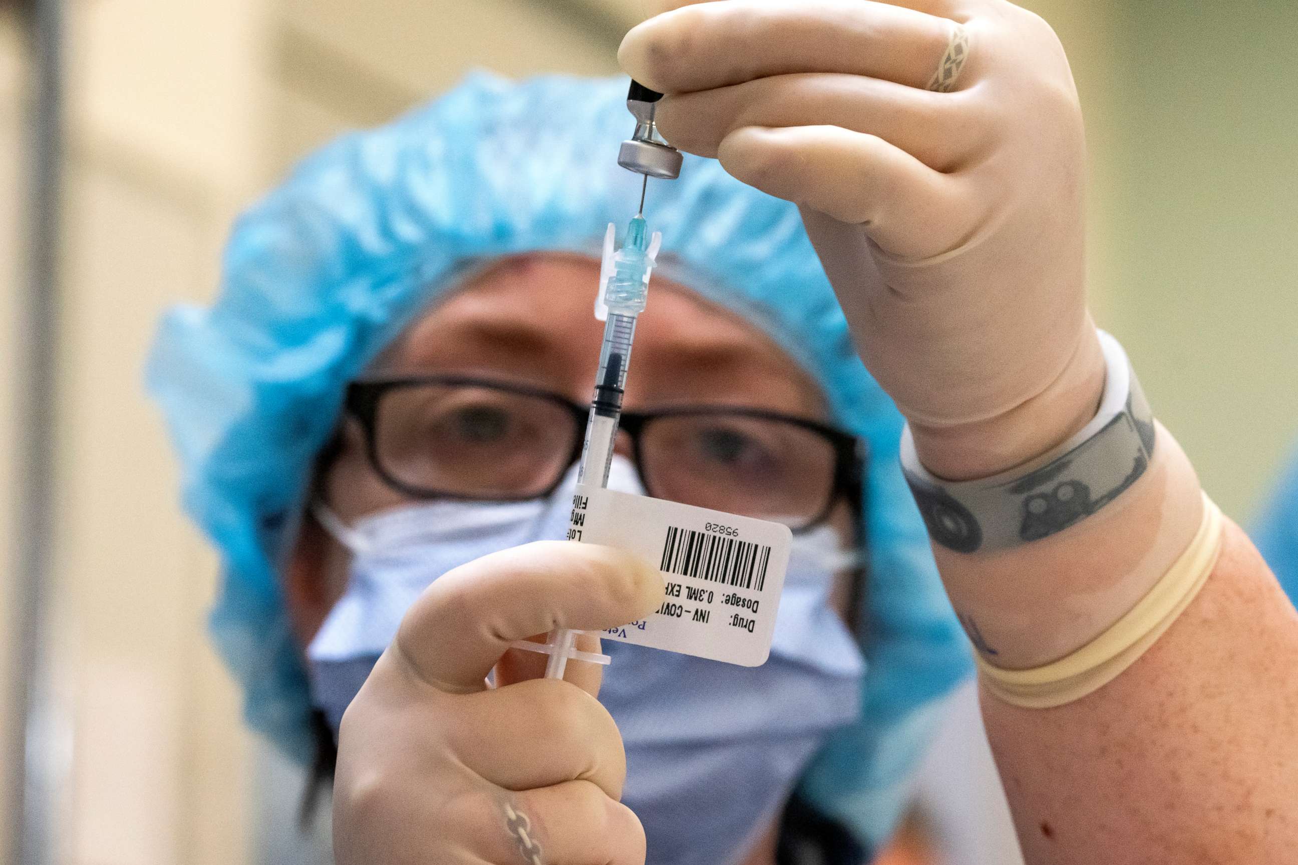 PHOTO: PORTLAND, OR - DECEMBER 16: A healthcare worker prepares COVID-19 vaccine doses at the Portland Veterans Affairs Medical Center on Dec. 16, 2020 in Portland, Oregon. The first rounds of Pfizer's vaccine were administered in Oregon on Wednesday.  