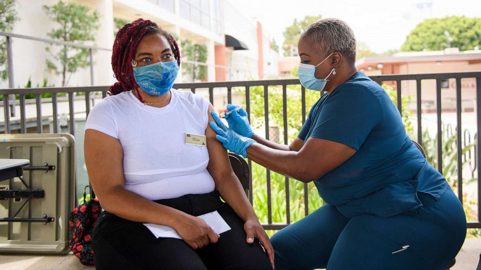 PHOTO: A nurse administers a dose of the Pfizer COVID-19 vaccine to a college student at the California State University Long Beach campus on Aug. 11, 2021, in Long Beach, Calif.