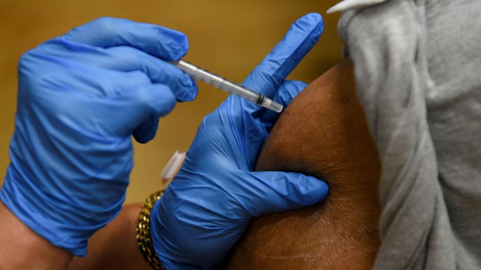 PHOTO: A person receives a vaccine for the coronavirus disease at Acres Home Multi-Service Center in Houston, Oct. 13, 2021. 
