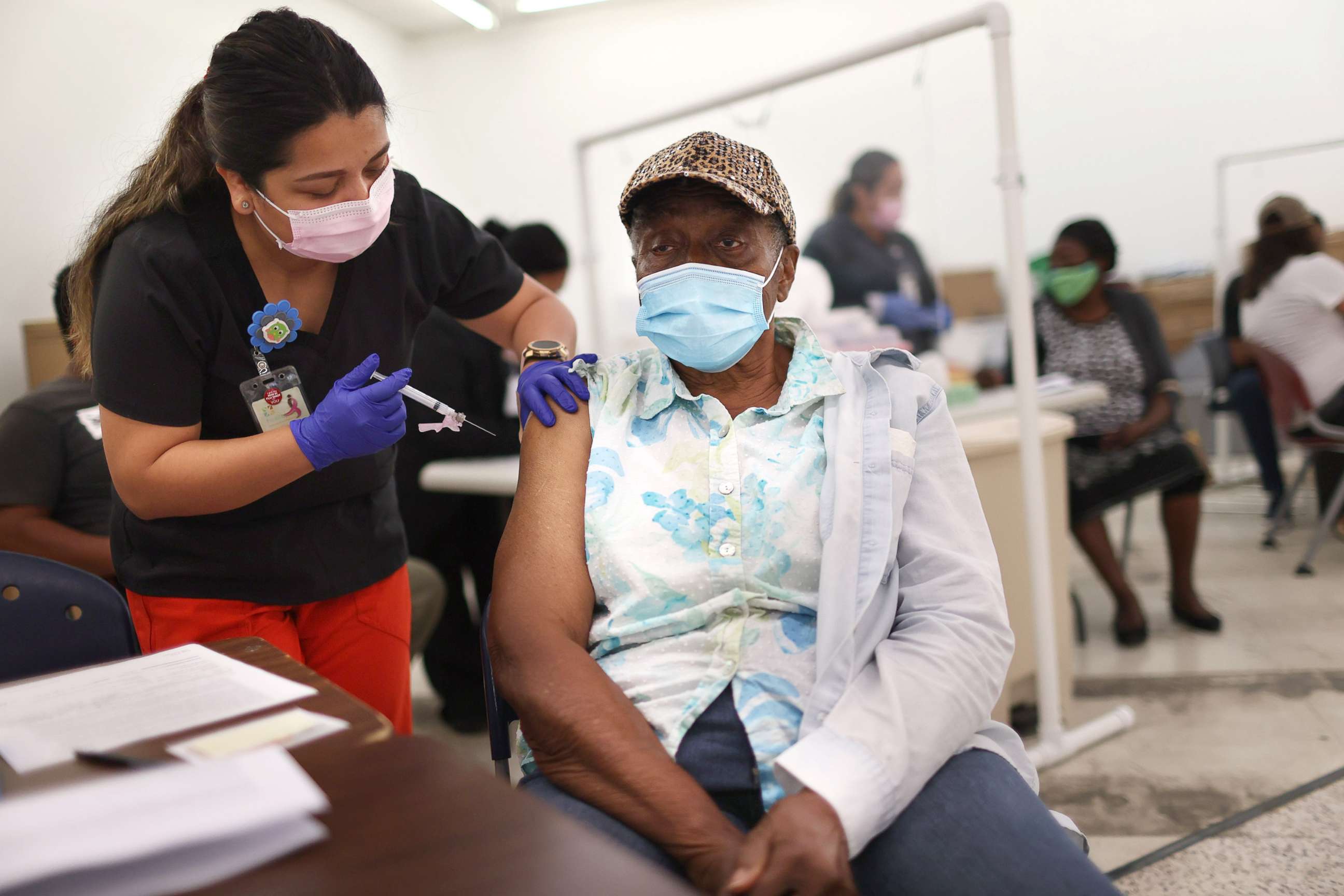 PHOTO: Anna Mendez, LPN, administers a Moderna COVID-19 vaccine to Vern Henderson at a clinic set up by Healthcare Network on May 20, 2021 in Immokalee, Florida.