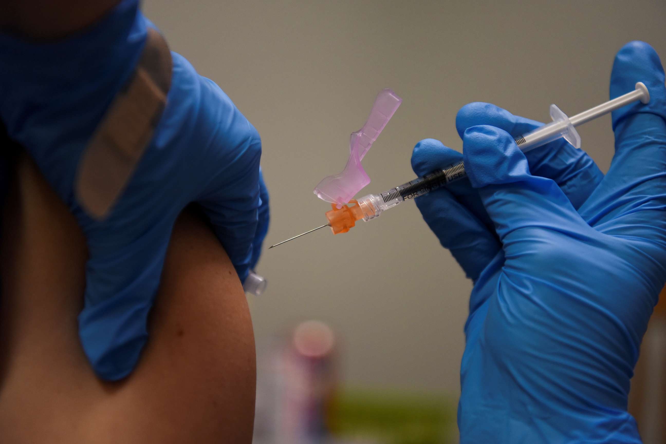 PHOTO: A person receives a COVID-19 vaccine at Floyd's Family Pharmacy as cases of the coronavirus disease (COVID-19) surge in Ponchatoula, Louisiana, Aug. 5, 2021.