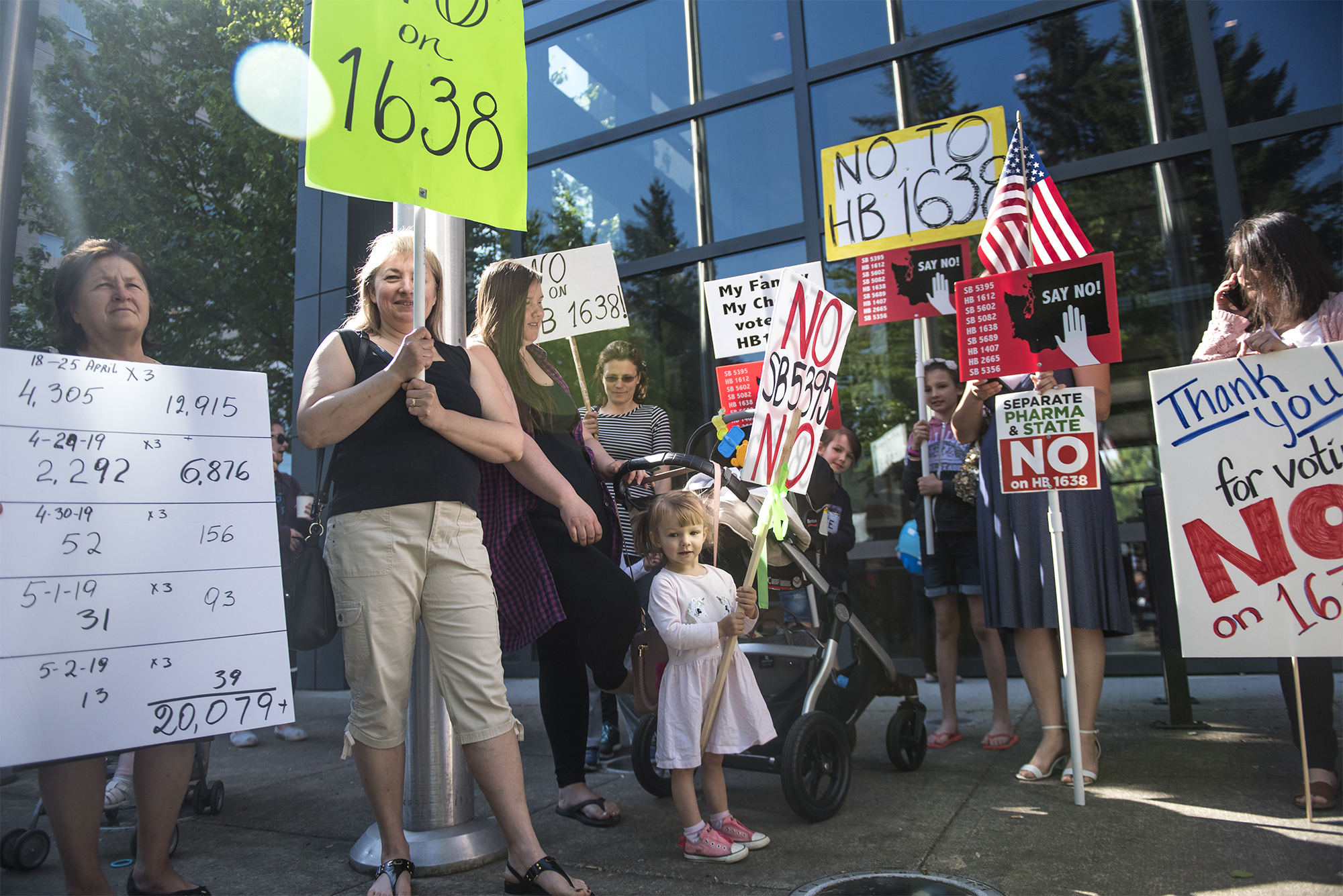 PHOTO: A group of anti-vaccine protesters gather in front of Vancouver City Hall prior to the signing of HB 1638 in Vancouver, Wash., on May 10, 2019.