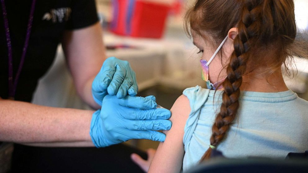 PHOTO: A nurse administers a pediatric dose of the COVID-19 vaccine to a girl at a L.A. Care Health Plan vaccination clinic at Los Angeles Mission College in Los Angeles, Jan. 19, 2022.