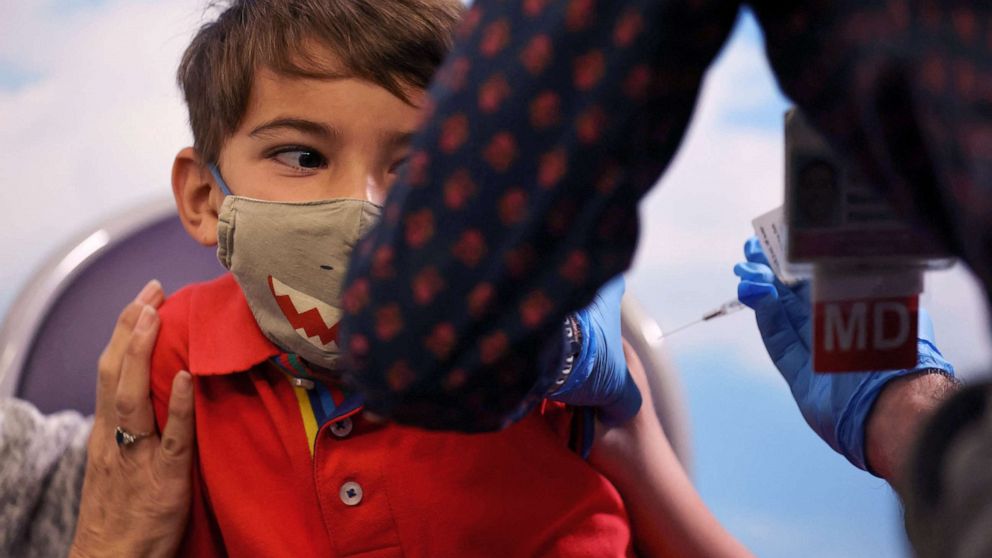 PHOTO: Five-year-old Milo from Chula Vista, Calif., receives the Pfizer-BioNTech coronavirus vaccine at Rady's Children's hospital vaccination clinic in San Diego, Calif., Nov. 3, 2021.