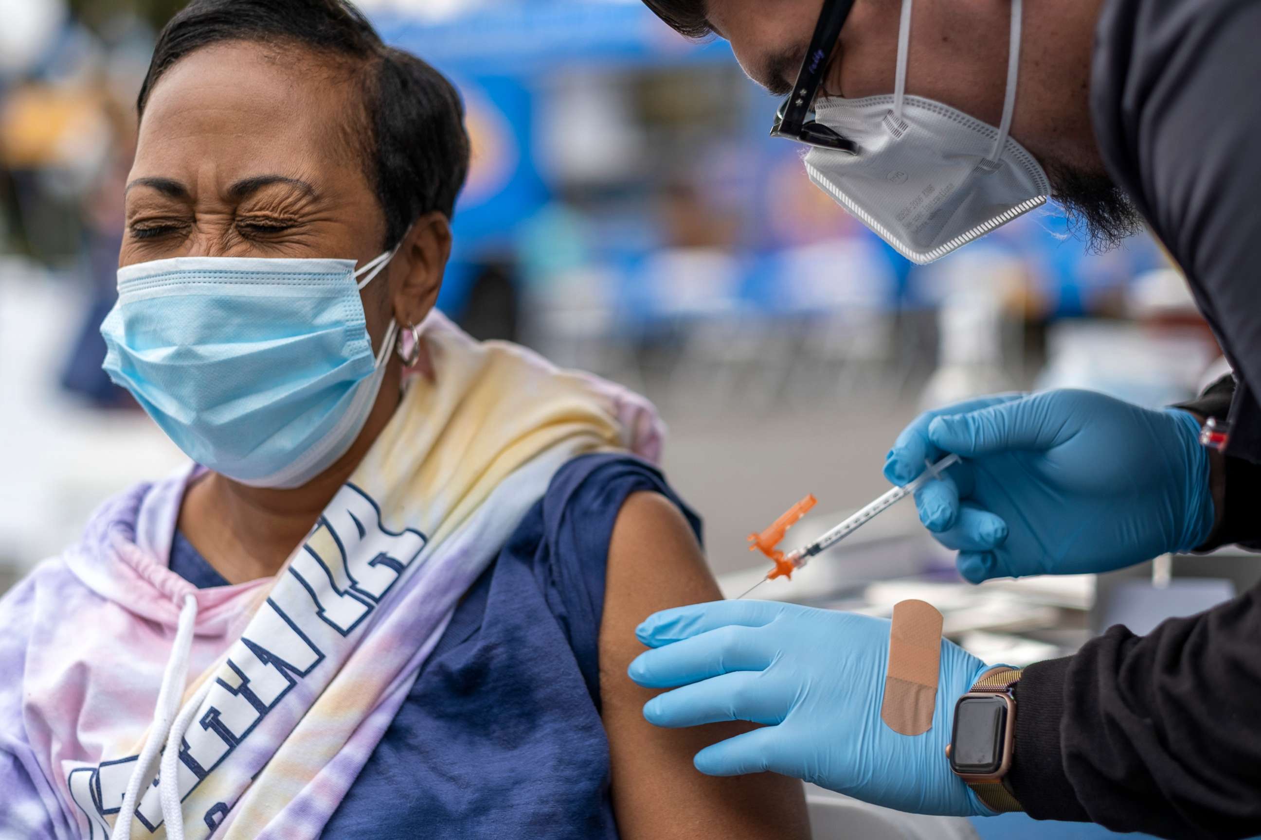 PHOTO: In this Jan. 29, 2022, file photo, a woman receives a COVID-19 vaccine at the historic First African Methodist Episcopal Church (FAME) in Los Angeles.