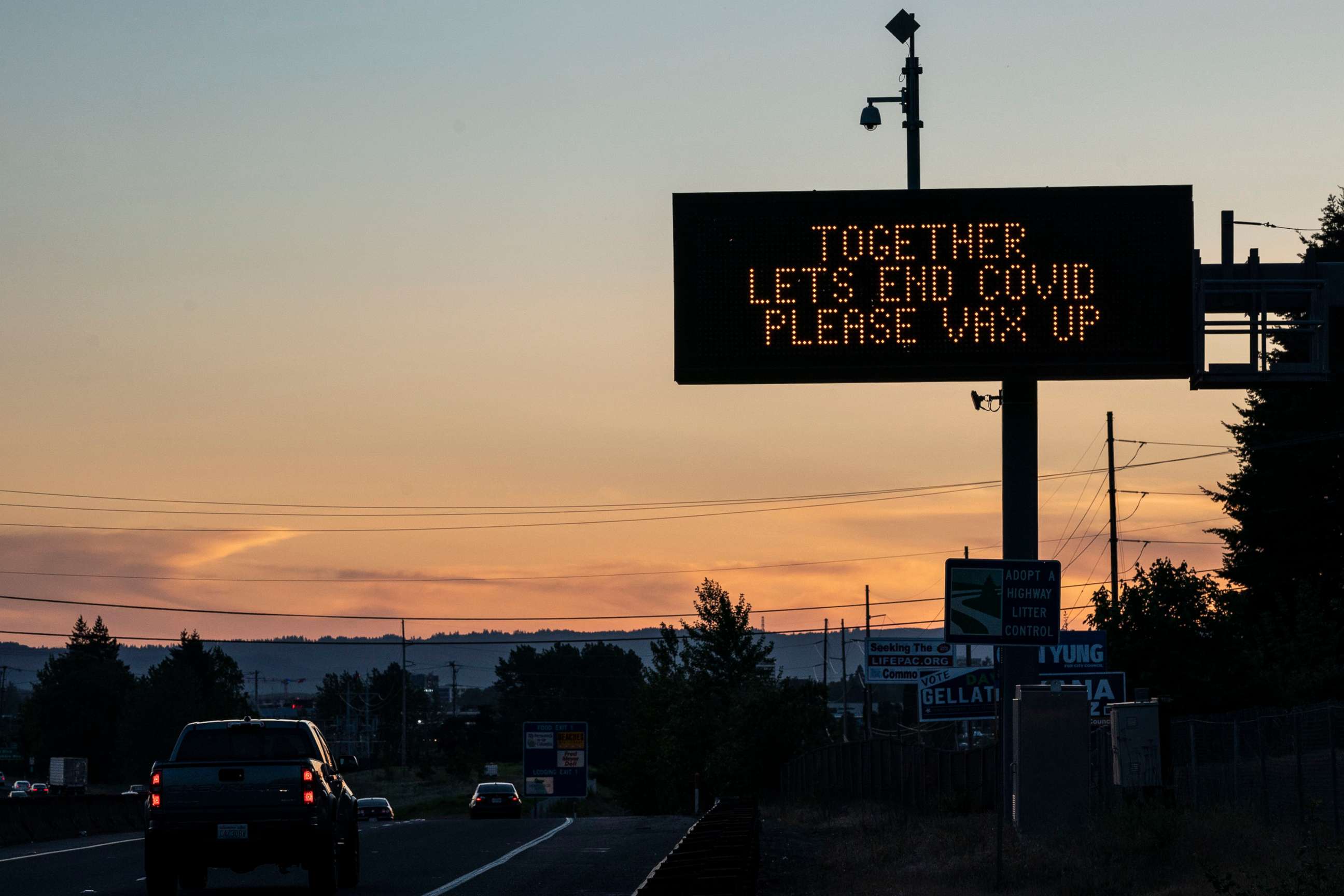 PHOTO: A digital highway sign promotes COVID-19 vaccination on May 14, 2021 in Vancouver, Wash.