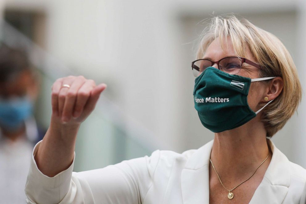 PHOTO: German Education Minister Anja Karliczek wears a face mask with the words "science matters" as she leaves a news conference about a German program to support the developing of a COVID-19 vaccine in Berlin, Tuesday, Sept. 15, 2020.