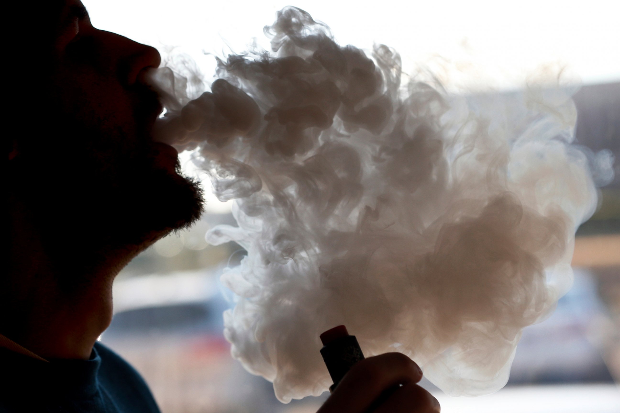 PHOTO: In this Friday, Jan. 18, 2019 file photo, a man exhales a puff of smoke from a vape pipe at a shop in Richmond, Va.