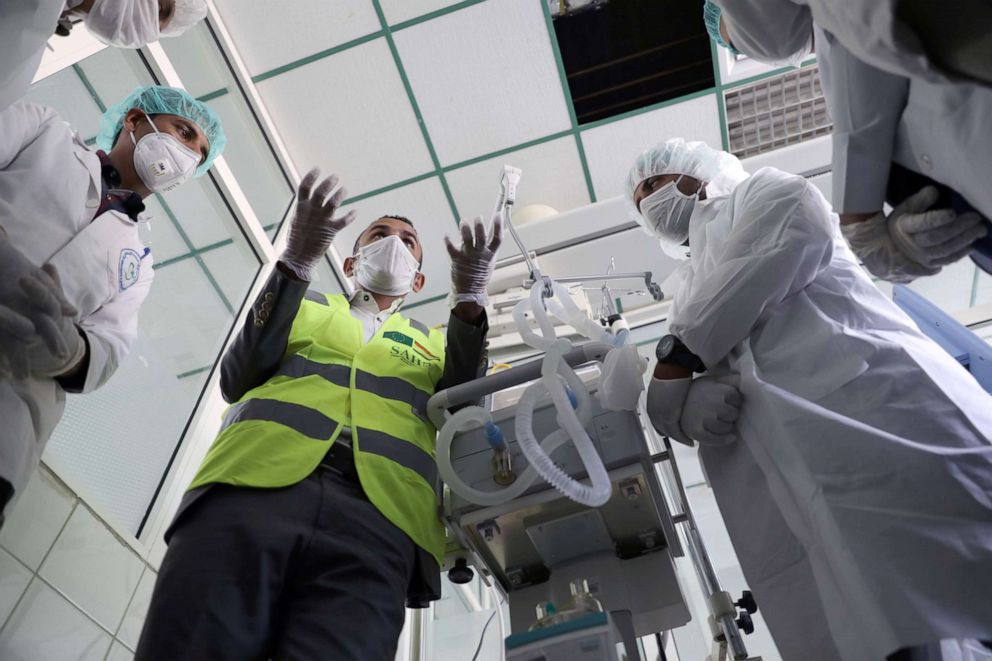 PHOTO: Nurses receive training on using ventilators recently provided by the World Health Organization at the intensive care ward of a hospital allocated for coronavirus patients.