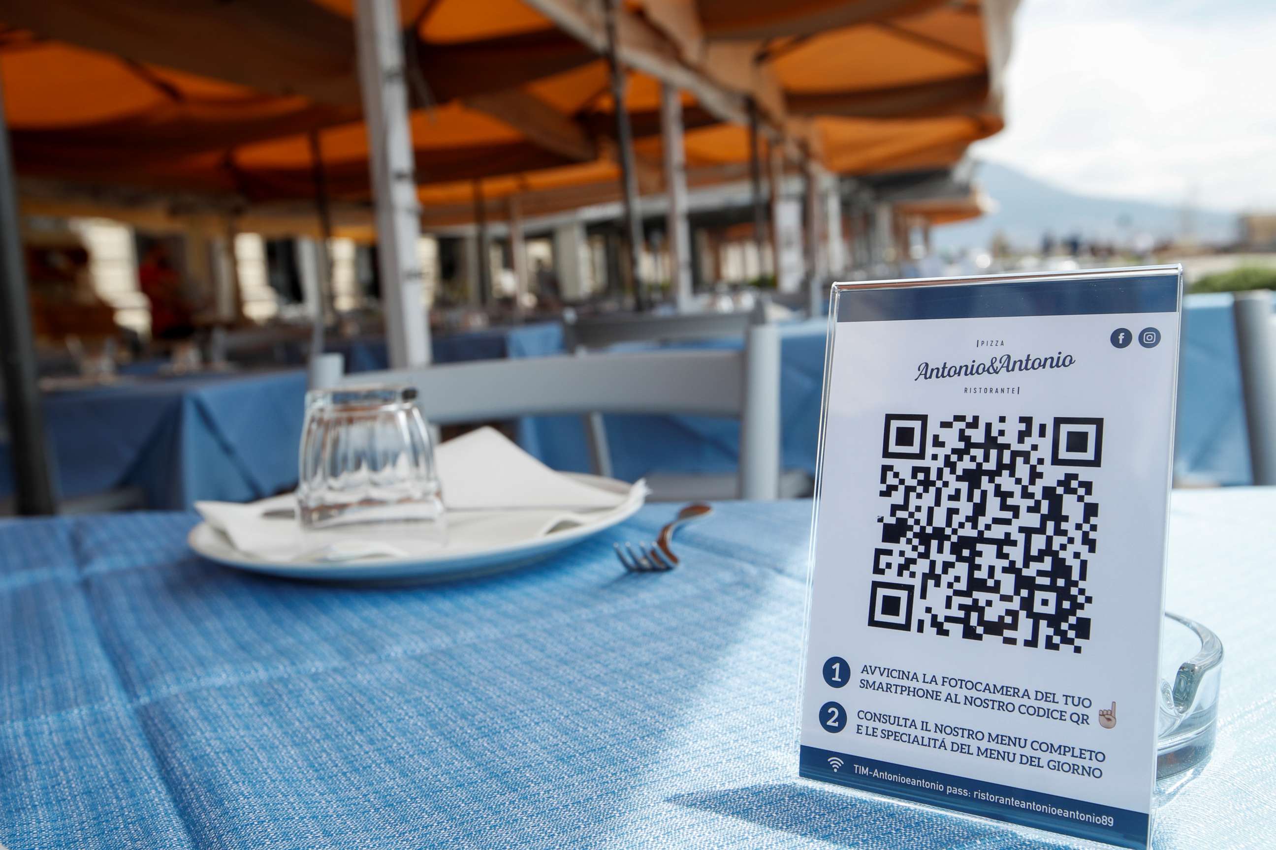 PHOTO: A view shows a QR code for the menu of the restaurant before its reopening on the waterfront in Naples, as Italy eases some of the lockdown measures put in place during the COVID-19 outbreak, in Naples, Italy, May 21, 2020.