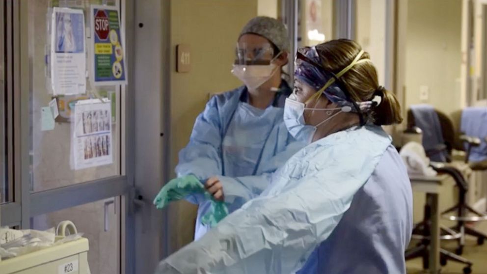 PHOTO: Staff put on PPE at St. Luke's Meridian in Idaho.