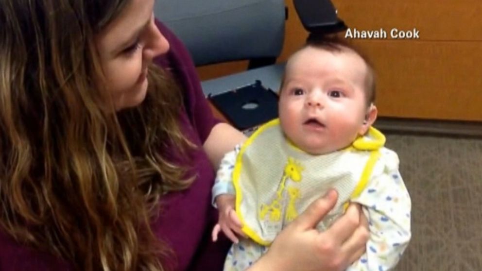 Elijah Cook was given hearing aids after being born with hearing loss.