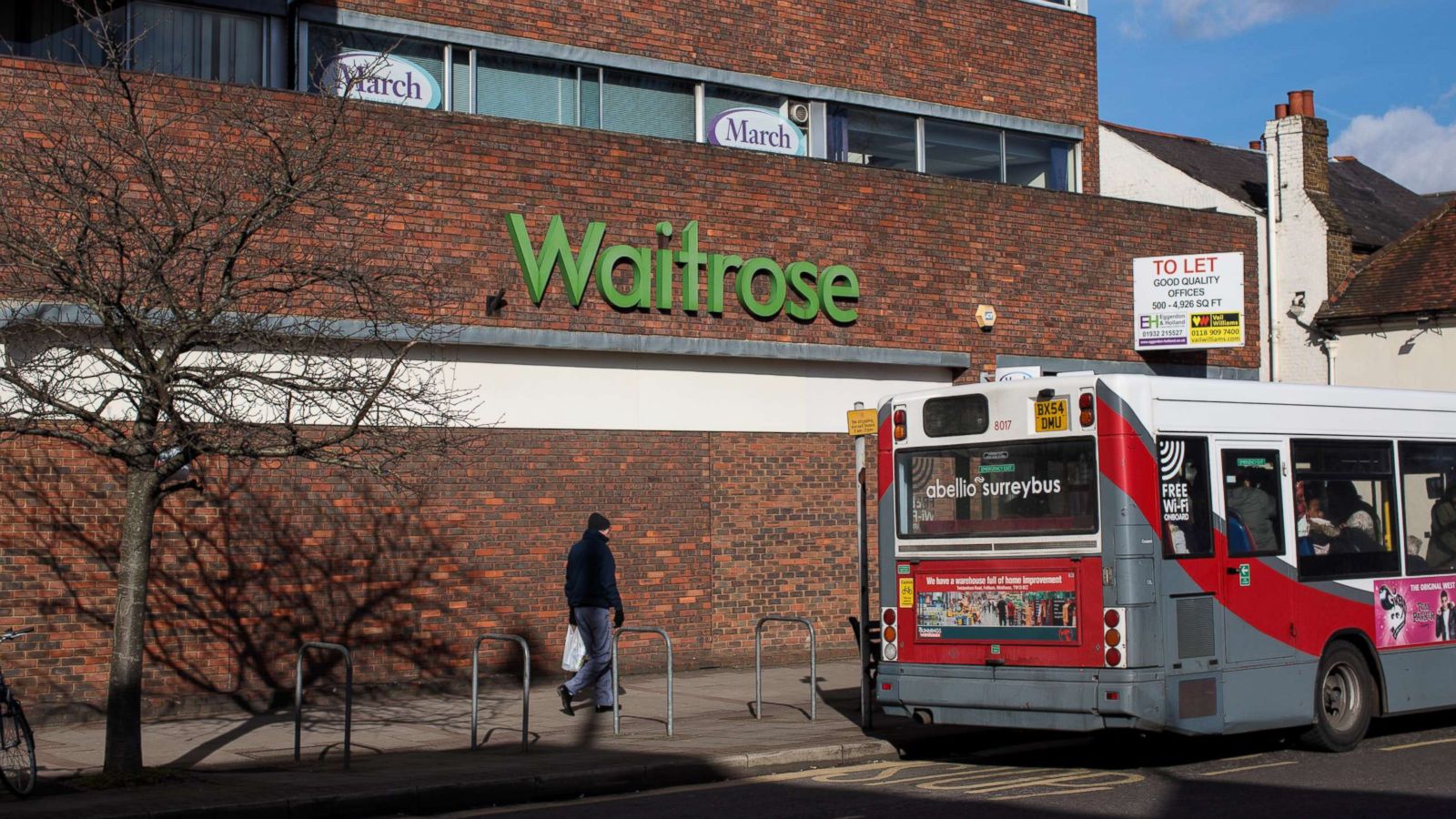 PHOTO: A Surrey local bus stands at a bus stop in front of a Waitrose supermarket, Feb. 12, 2018 in Weybridge, England.