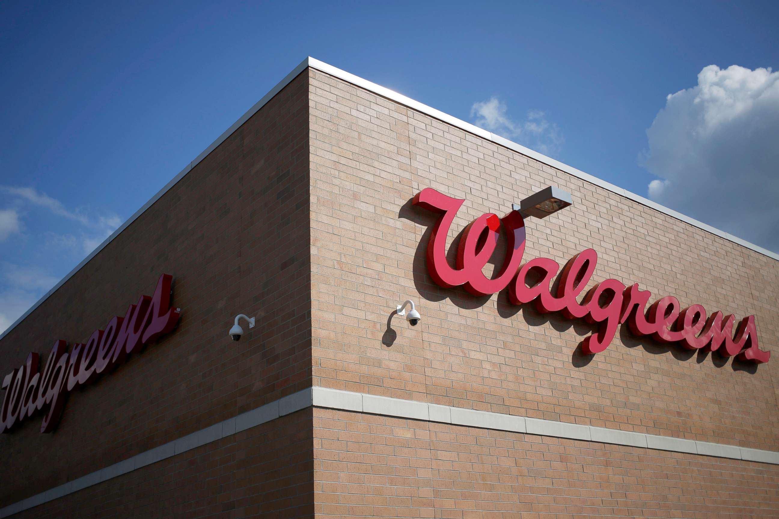 PHOTO: Walgreen Co. signage is displayed outside one of the company's stores in Louisville, Ky., Sept. 30, 2013.