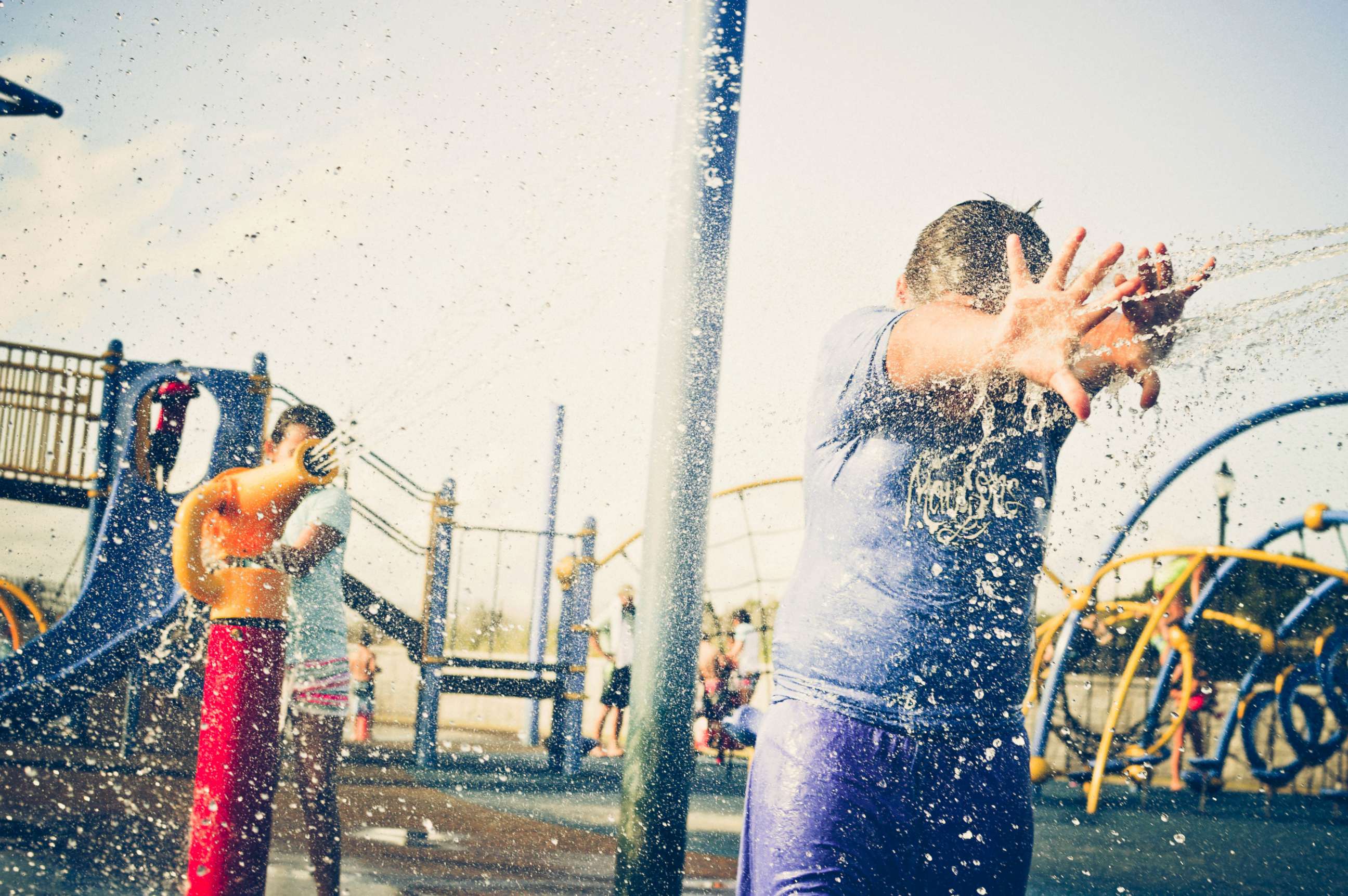PHOTO: Children play a water playground in this stock photo.