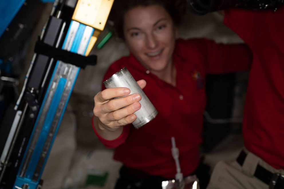 PHOTO: NASA astronaut Kayla Barron replaces a filter in the space station’s Brine Processor Assembly.