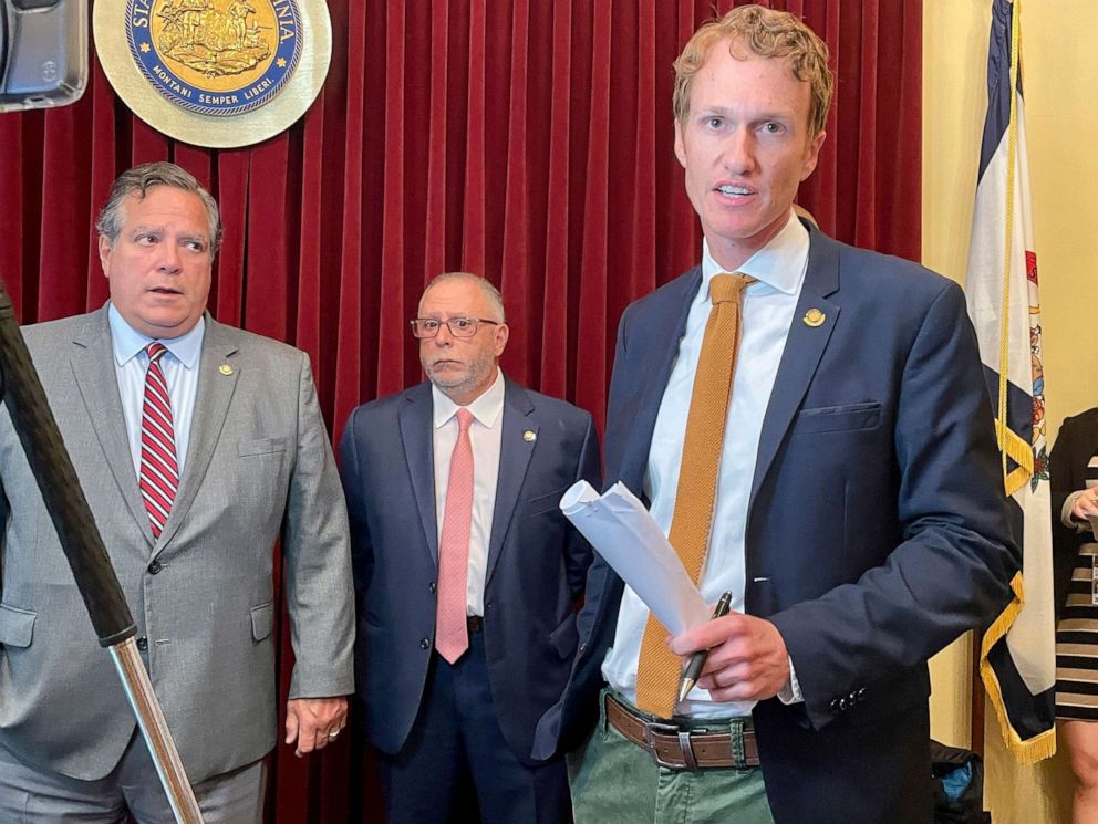 PHOTO: West Virginia Senate minority leader Stephen Baldwin, right, speaks during a news conference prior to the start of a Senate session, on July 29, 2022, in Charleston, W.Va. Behind him are fellow Democratic Sens. Mike Romano left, and Mike Caputo.