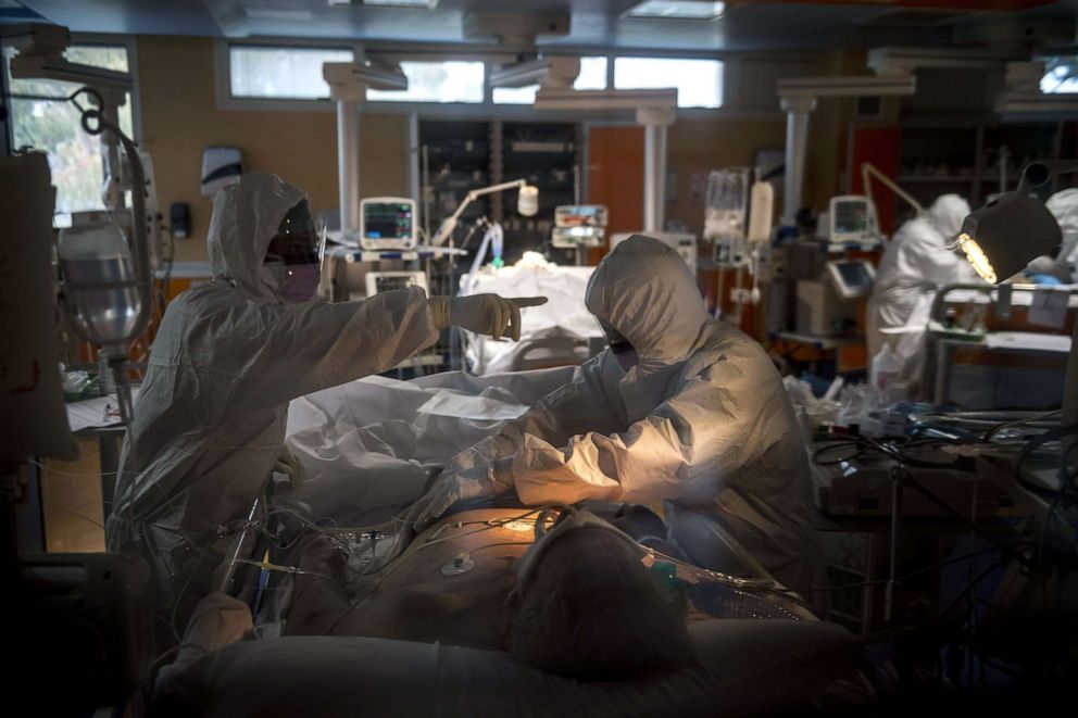 PHOTO: Doctors treat COVID-19 patients in an intensive care unit at the third Covid 3 Hospital (Istituto clinico CasalPalocco) during the Coronavirus emergency, March 26, 2020, in Rome, Italy.