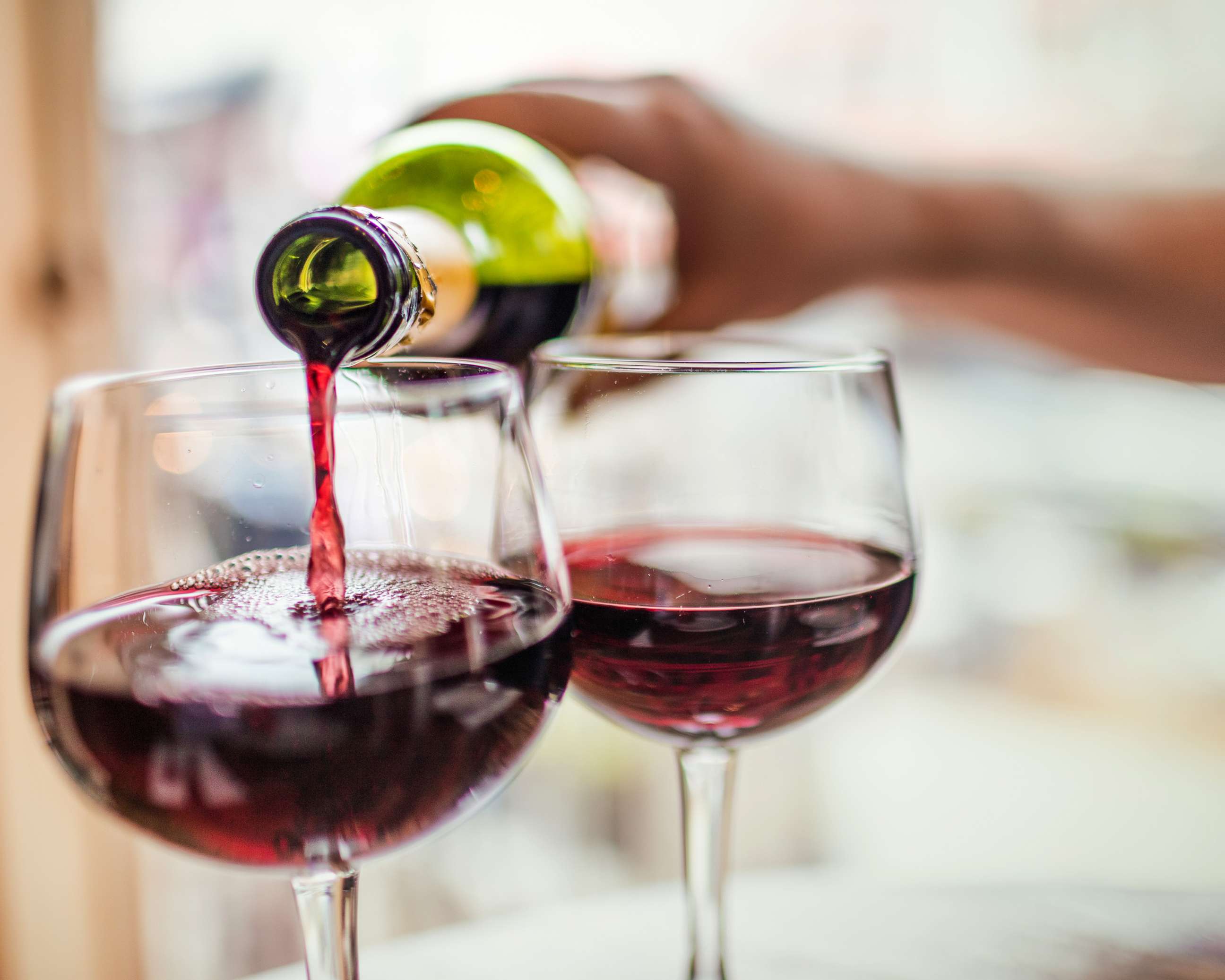 PHOTO: A man pours red wine in an undated stock photo.