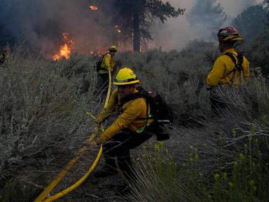 AP PHOTOS: Hallmarks of climate change seen in floods, fires and drought around the globe