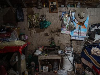 AP PHOTOS: A rural doctor traverses mountainous terrain by donkey to visit far-flung patients