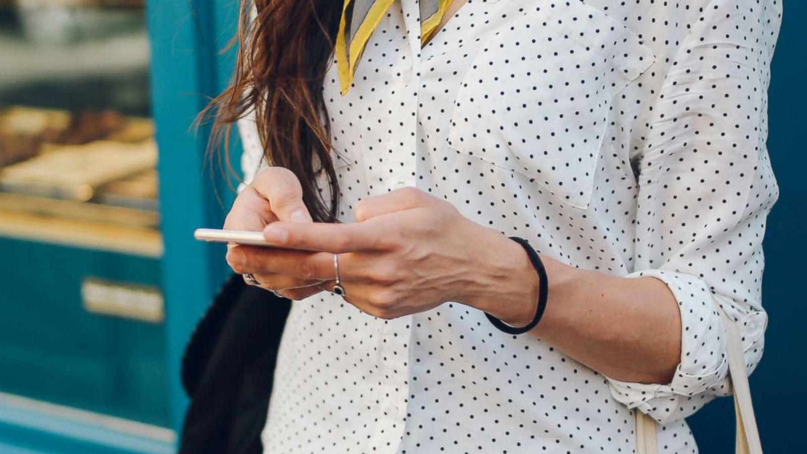 PHOTO: A woman holds a cell phone in this undated stock photo.