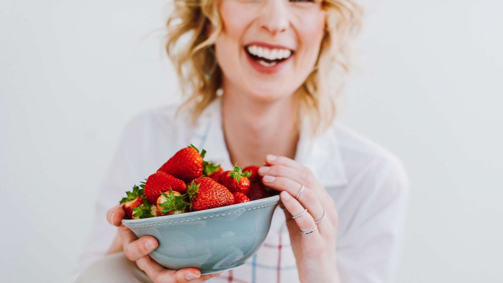 PHOTO: A woman eats strawberries in this undated stock photo.