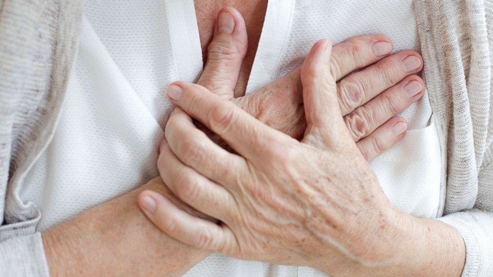 PHOTO: A senior woman holds her hands to her chest in an undated stock photo.