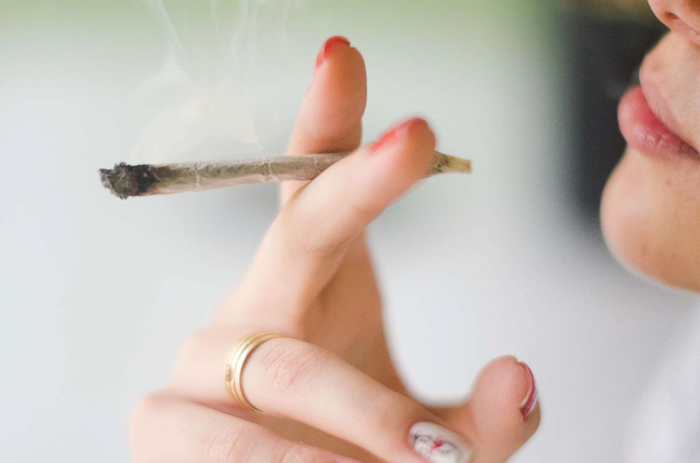 PHOTO: A woman smokes marijuana in this undated stock photo.