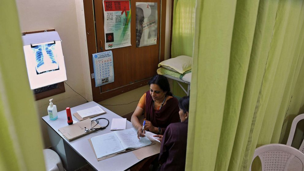PHOTO: An HIV-positive patient consults a doctor during a medical check-up at the Anti Retroviral Therapy (ART) clinic in Bangalore, India, July 20, 2012. 
