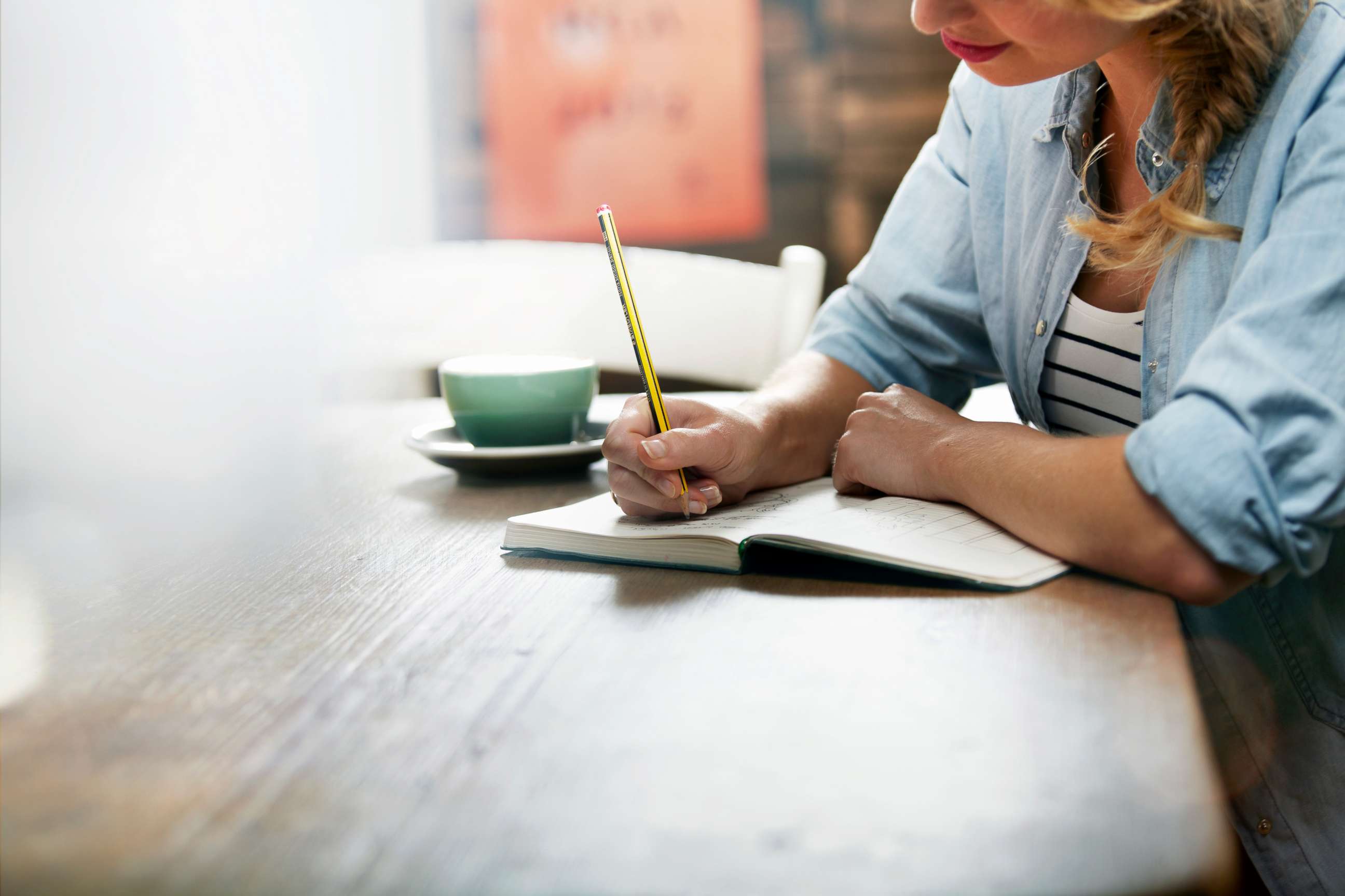 PHOTO: A woman writes in this stock photo.