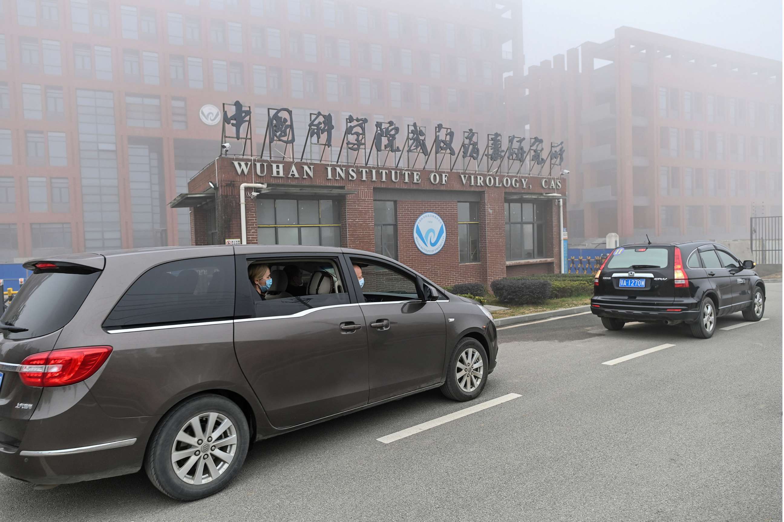 PHOTO: Members of the World Health Organization (WHO) team investigating the origins of the COVID-19 coronavirus, arrive at the Wuhan Institute of Virology, Feb. 3, 2021, in Wuhan in China's central Hubei province.