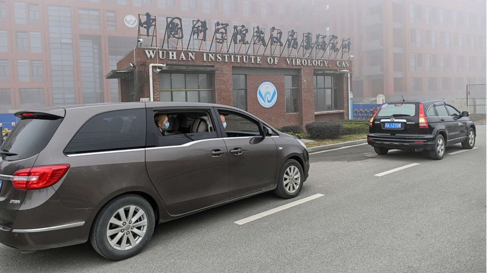 PHOTO: Members of the World Health Organization (WHO) team investigating the origins of the COVID-19 coronavirus, arrive at the Wuhan Institute of Virology, Feb. 3, 2021, in Wuhan in China's central Hubei province.