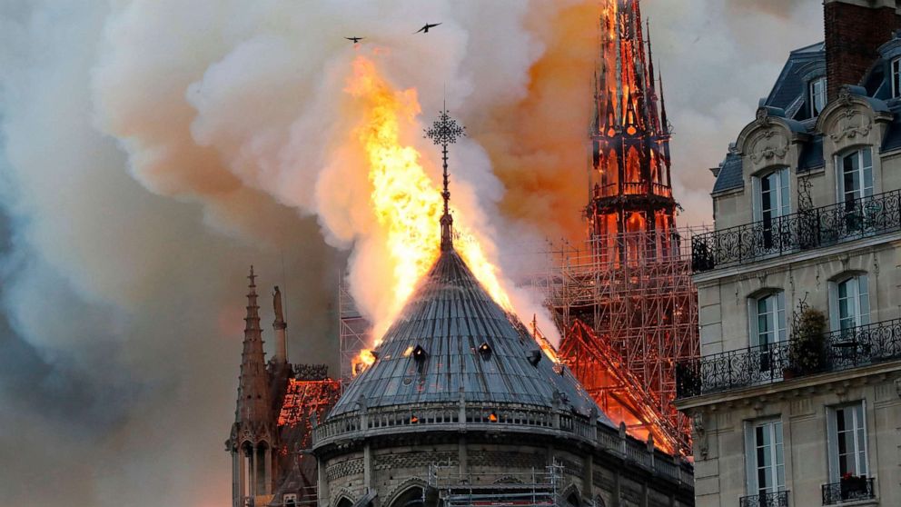 PHOTO: Smoke and flames rise during a fire at the Notre-Dame Cathedral in central Paris on April 15, 2019.