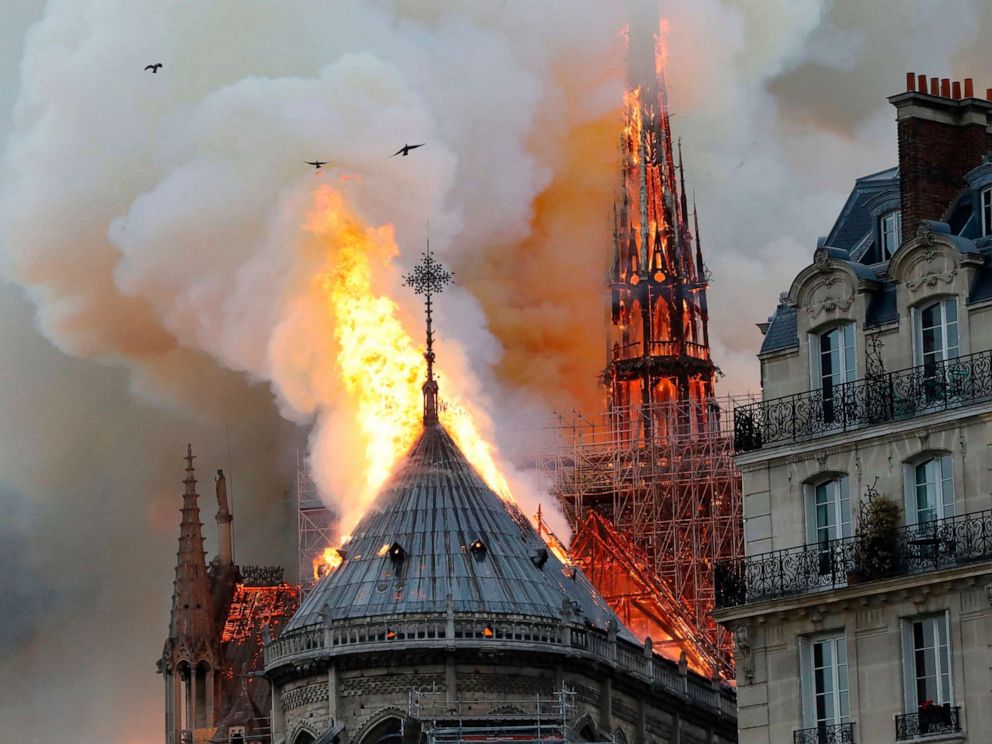 PHOTO: Smoke and flames rise during a fire at the Notre-Dame Cathedral in central Paris on April 15, 2019.
