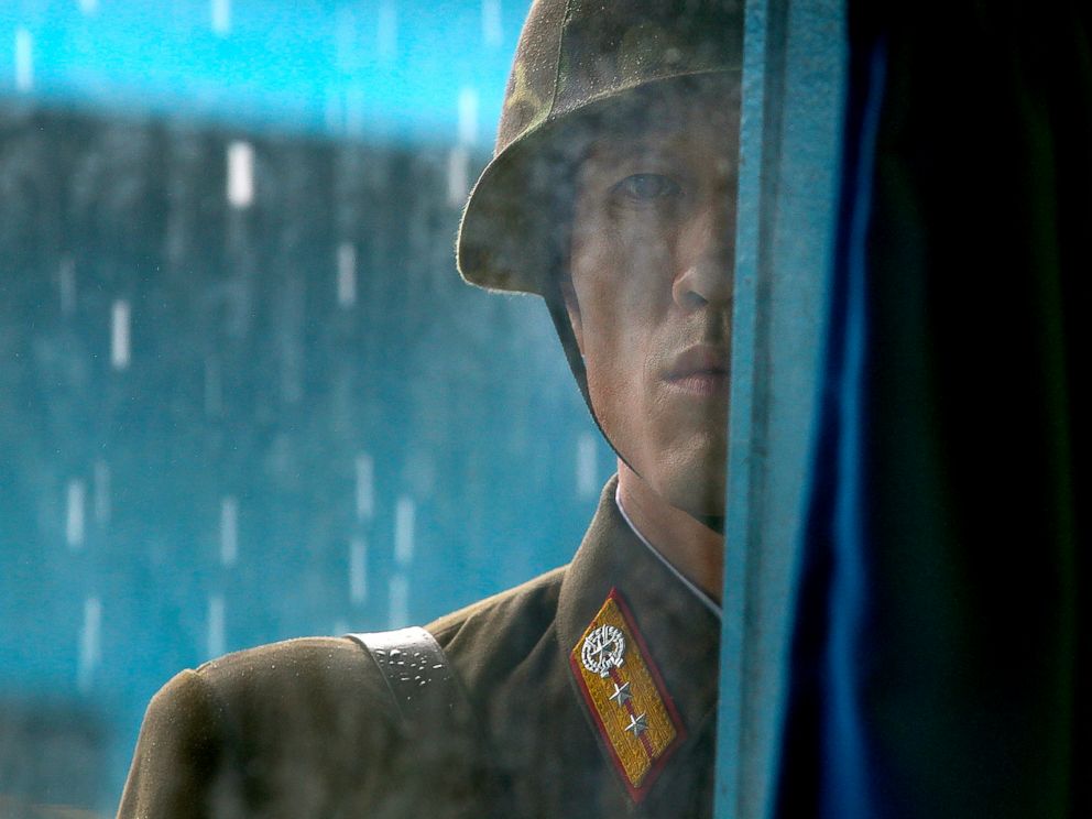 PHOTO: A North Korean soldier looks through the window of the building that sits on the Demilitarized Zone (DMZ) in Panmunjom, South Korea, that separates the two Koreas, July 21, 2010.