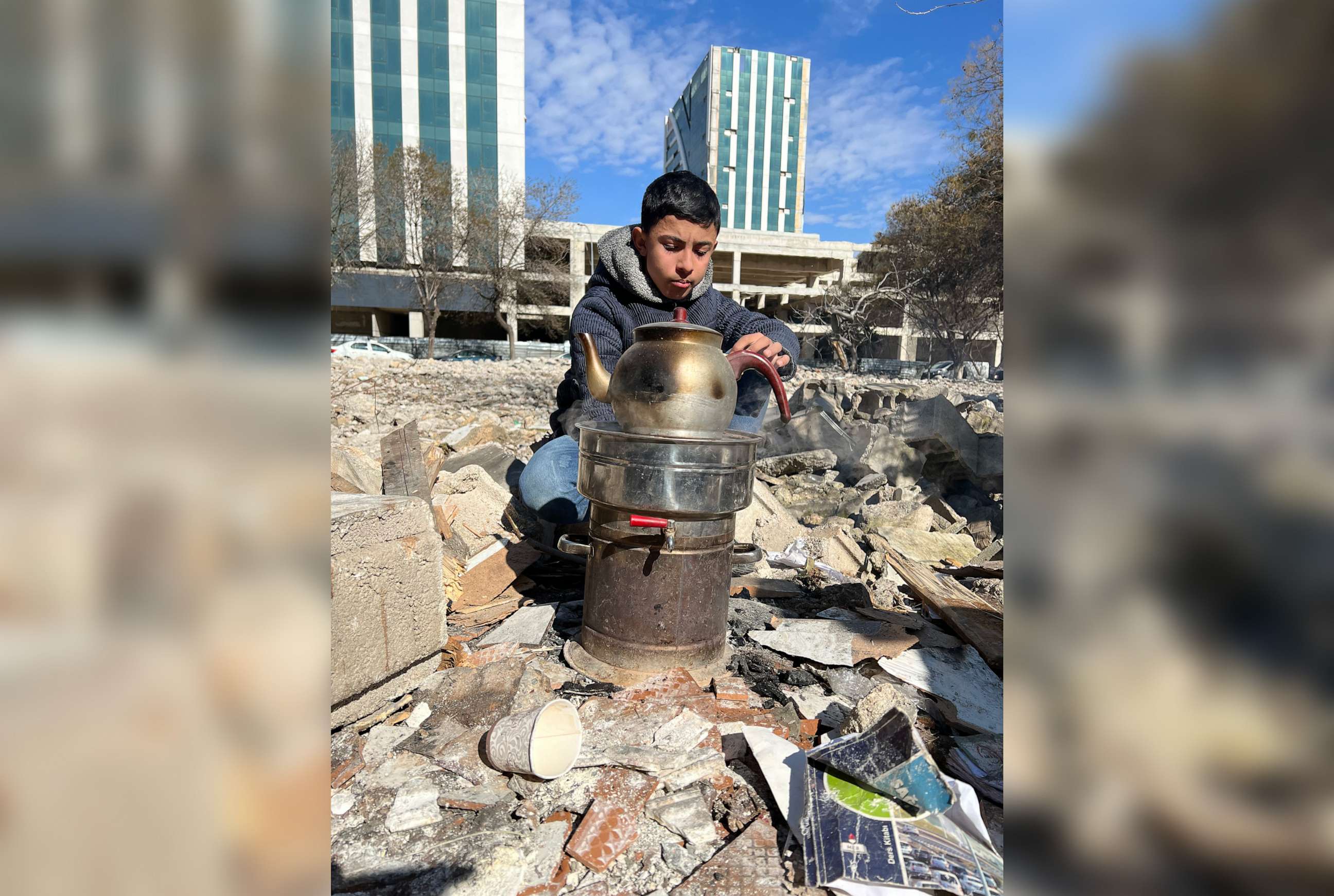 PHOTO: A young boy, who is now homeless, waits to hear back from a relative in Gaziantep, Turkey.